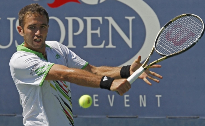 Marsel �lhan, ABD A��k'tan elendi