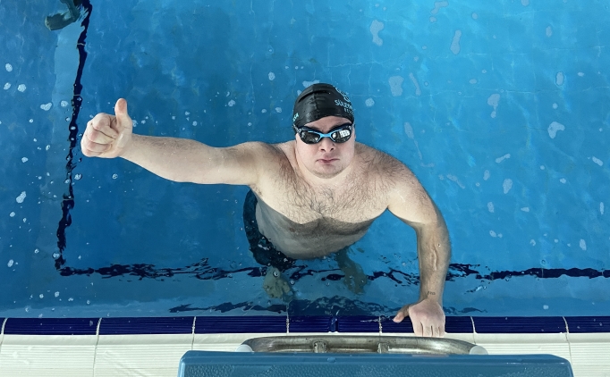 Down sendromlu O�uzhan, mutlulu�a kula� at�yor