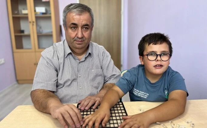 G�rme engelli halterci ��retmen oldu