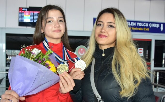 Haval� silahlarda Avrupa ���nc�s� olan Rana G�z�b�y�k, Erzurum'da �i�eklerle kar��land�