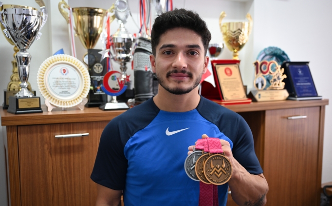 Milli halterci Muhammed Furkan'�n g�z� olimpiyatlarda!