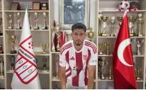 Ayval�kg�c�'nden iki i�eri bir d��ar�